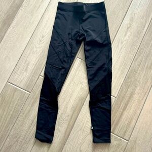 Xs black and sheer leggings.  Mid rise black